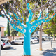 Illustration for article titled It took four miles of yarn to turn this tree into a knit squid